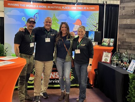Tom, Beth, and family members representing Monster Tree Service of Greenville County at a expo